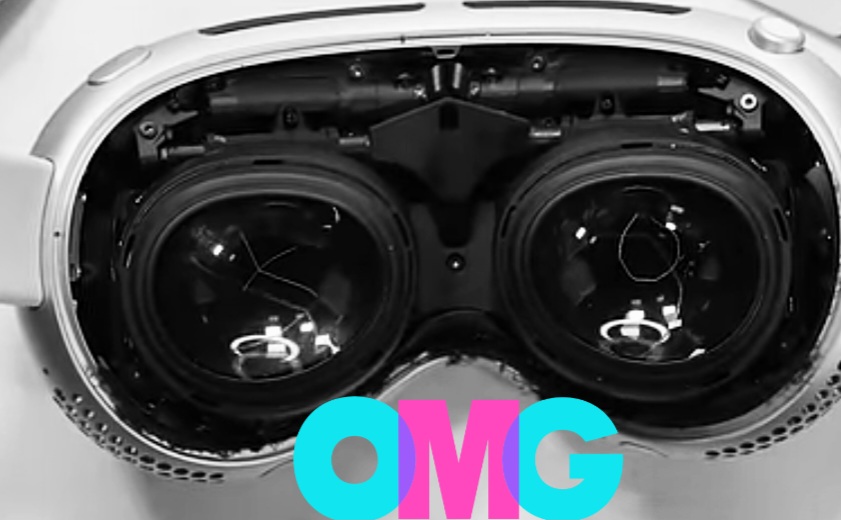 A black and white photo of a broken virtual reality R1 and M2 chips in Vision Pro headset with the word "OMG" written on it. The headset appears to be cracked and damaged around the lenses and bridge of the nose.