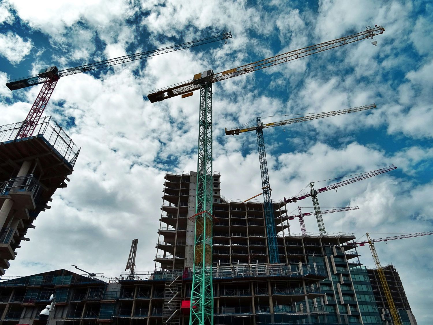 slab shuttering work using crane at construction site